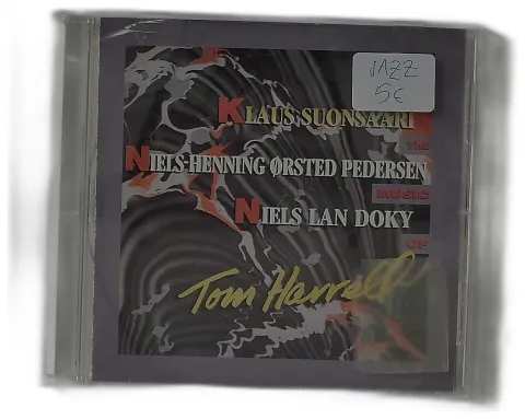 TOM HARRELL