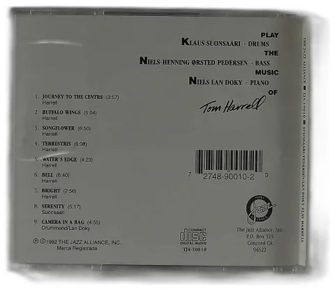 TOM HARRELL